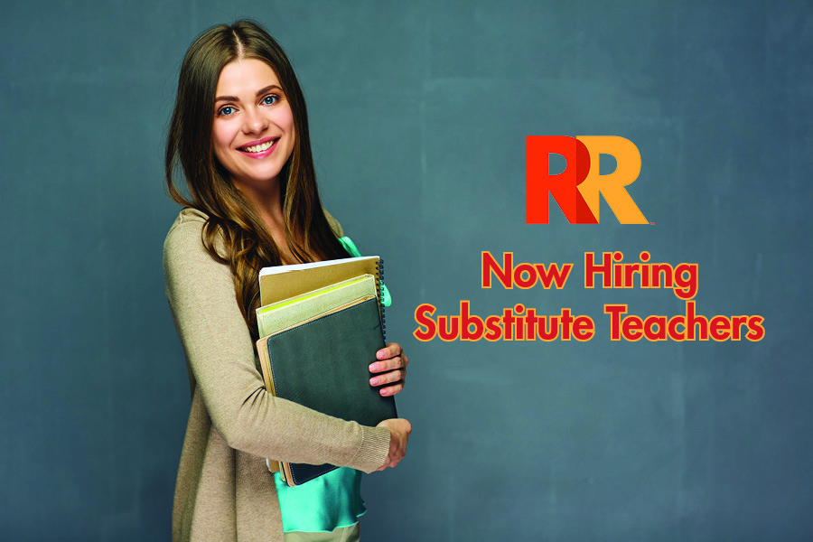 Now hiring substitute teachers written on a chalkboard next to a woman holding a stack of books.