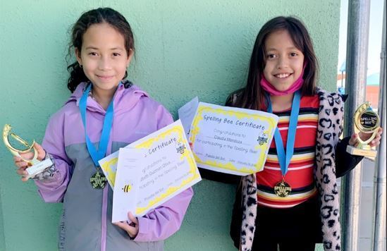 Photo of the two Spanish Spelling Bee winners from Puesta del Sol Elementary